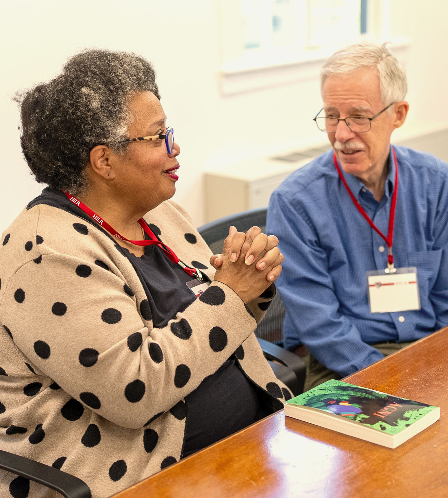 Two Harvard Institute for Learning in Retirement members talk in class.