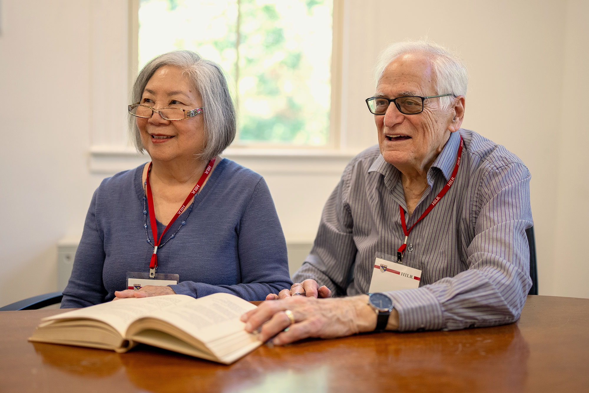 Two Harvard Institute for Learning in Retirement members sit in class.